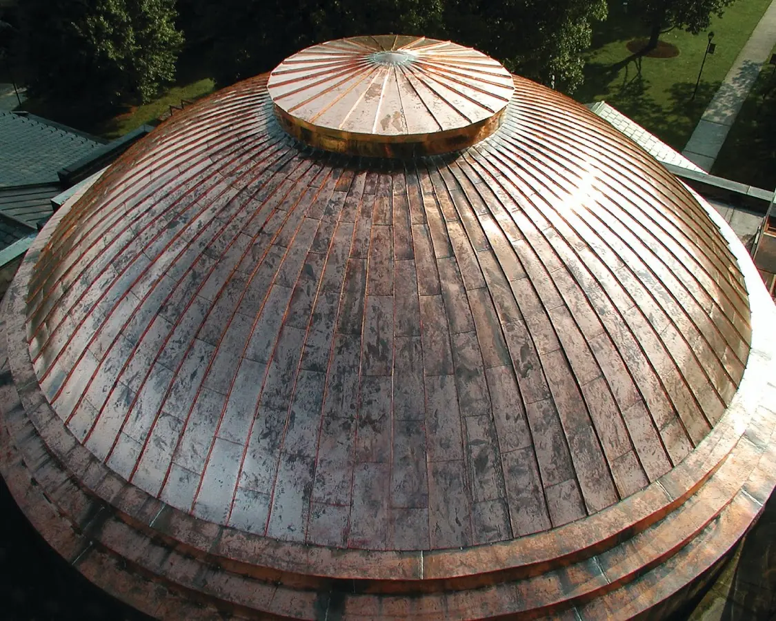 Craftsman Roofing crew installing a new roof in Williamson